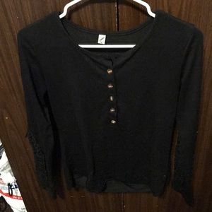 Black long sleeve shirt with lace on arms